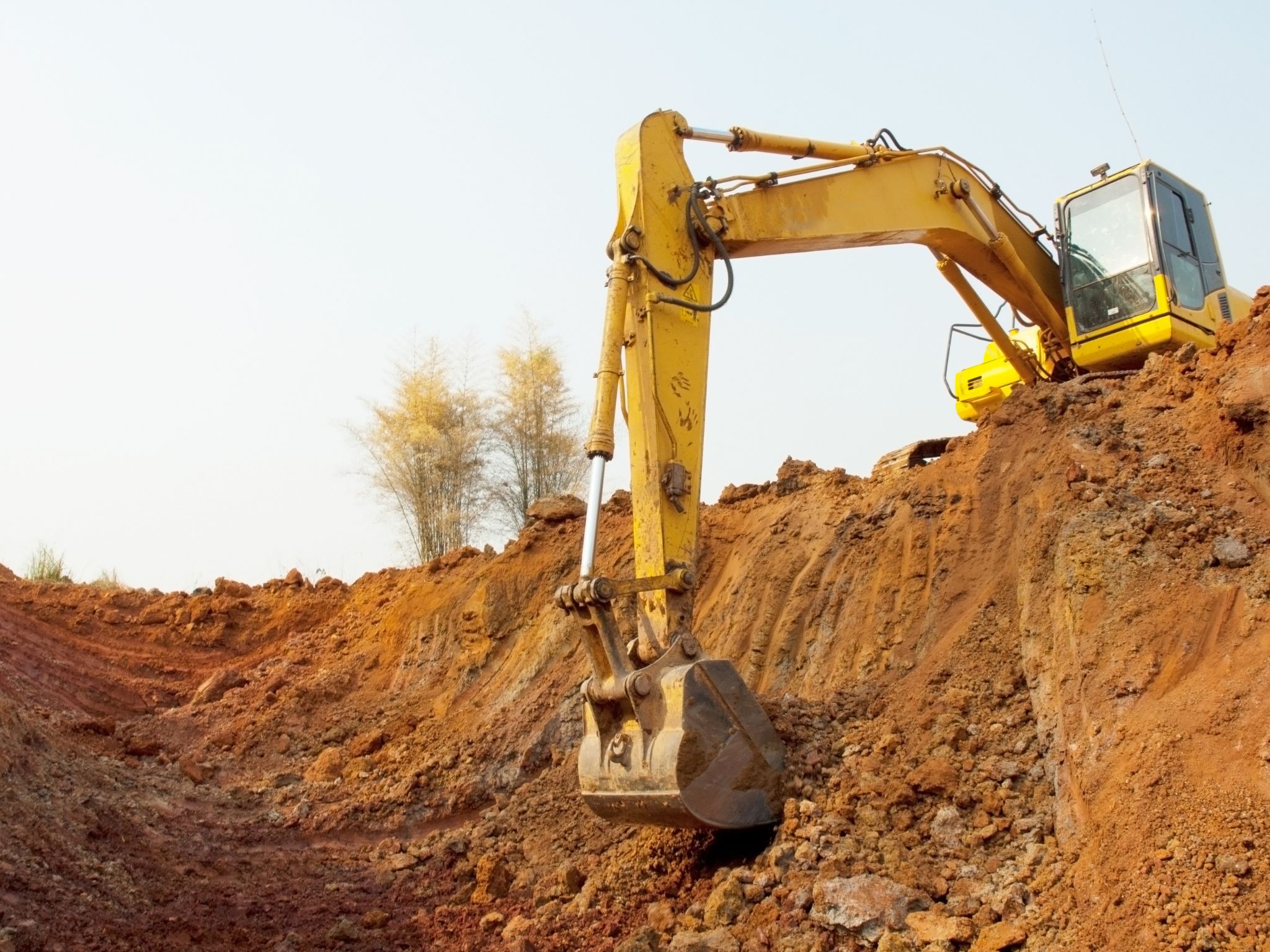 Excavator and equipment used by 1770 Dirtworks for earthmoving projects